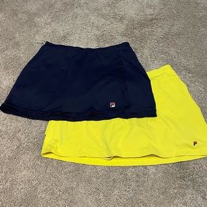 Two tennis skirts by Fila in Large. Yellow and blue